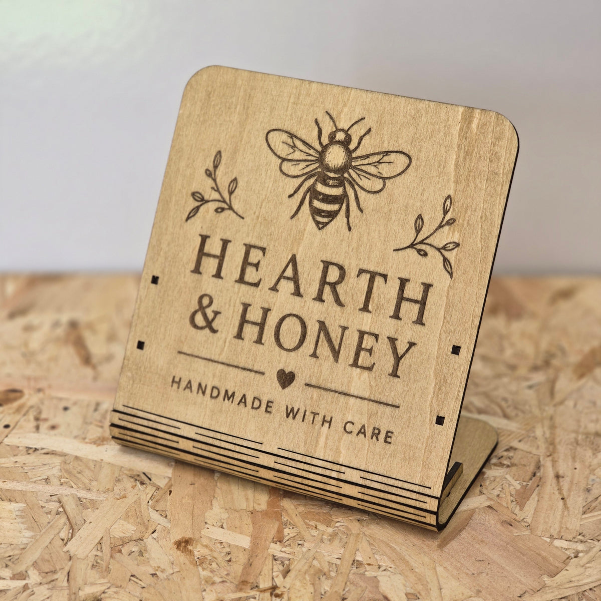 Custom wooden market stall sign with personalised business branding as a freestanding display